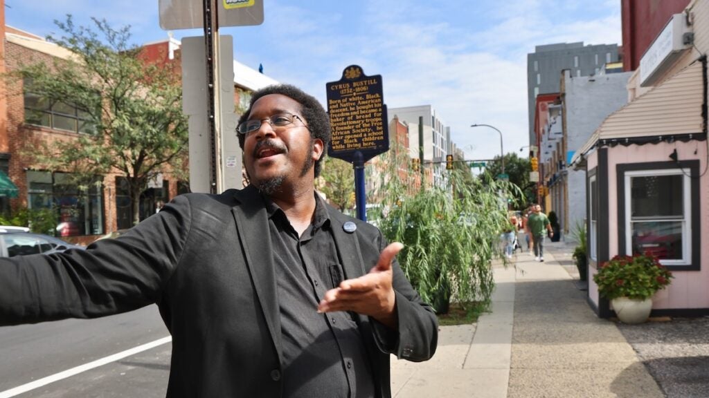 Mijuel Johnson posing for photo