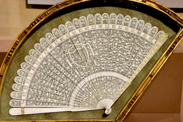An intricately design hand-made fan.