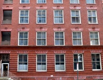 2026 03 26-e lee-philadelphia north broad street corporation for aging-proposed senior housing annex entrance on wallace street The exterior of a large brick building is shown.