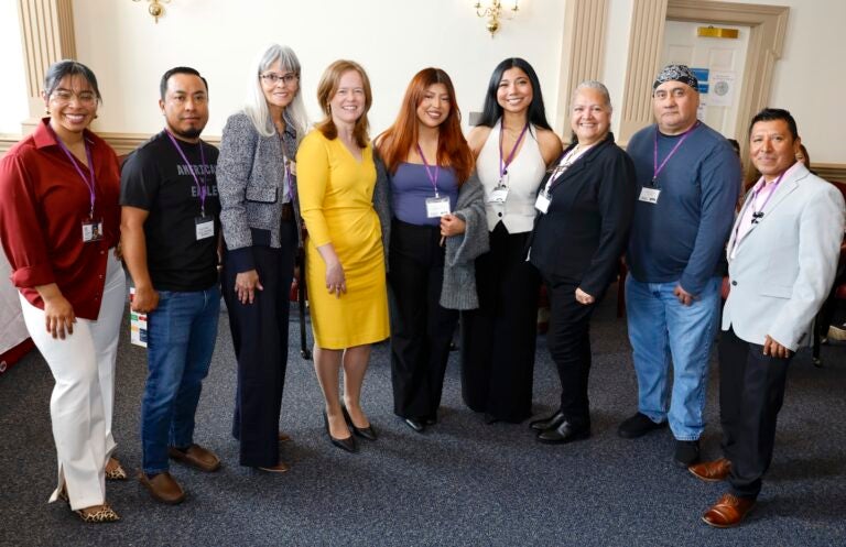 A large group of people standing together posing for a photo.