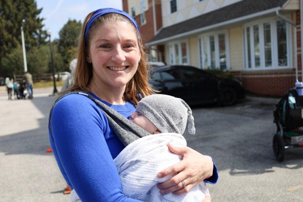 Bianca Charbonneau holding her son, Cassian