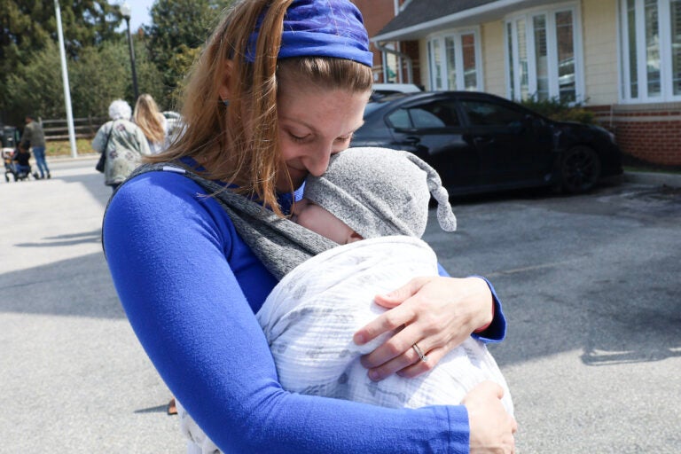 Bianca Charbonneau holding her son, Cassian