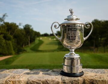 Wanamaker Trophy in front of the first hole at the Aronimink Golf Club
