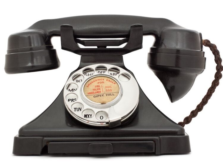 A photo of a Black bakelite telephone. (Darren Pullman/Bigstock)