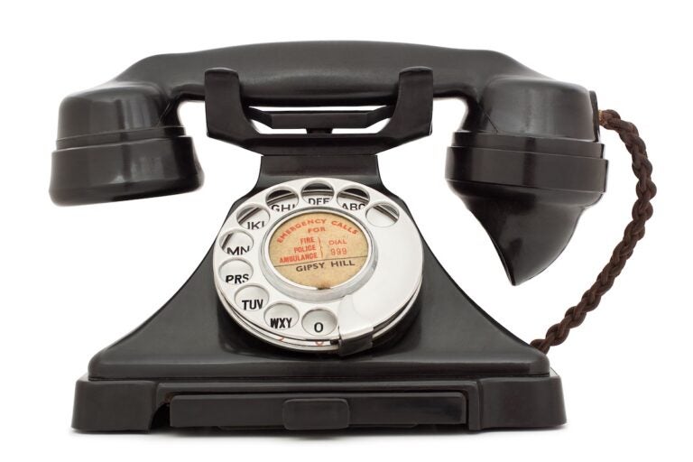 A photo of a Black bakelite telephone. (Darren Pullman/Bigstock)