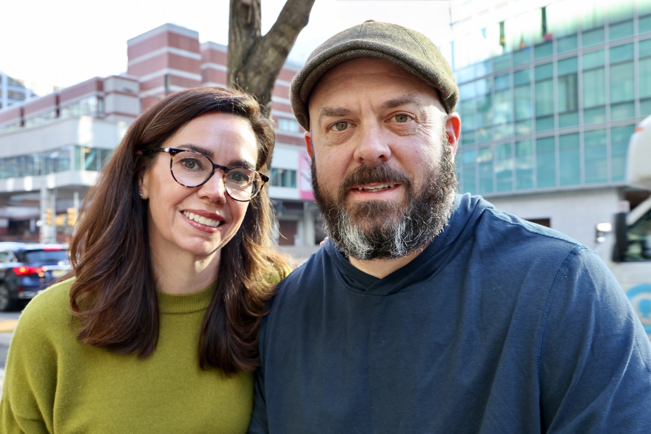 Dennis Massimo sits beside his sister, Lauren Massimo
