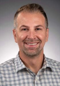 Jonathan Miller smiles