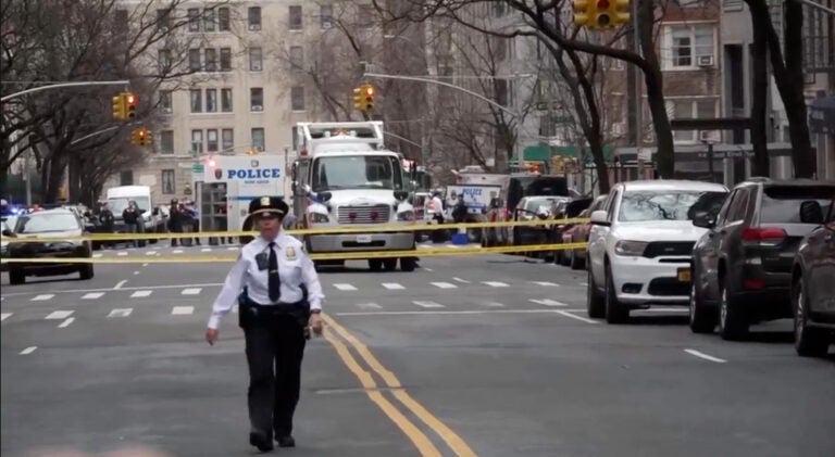 Law enforcement officers respond to Manhattan's Upper East Side