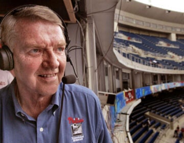 Philadelphia Phillies announcer Harry Kalas looks out over Veterans Stadium in Philadelphia