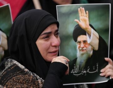 APTOPIX Lebanon Iran US Israel A woman cries as she mourns the death of Iranian Supreme Leader Ayatollah Ali Khamenei