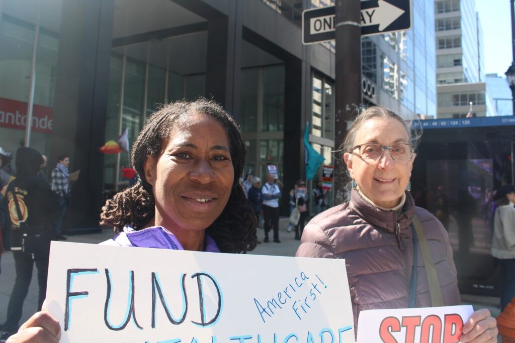 Iran protesters hold up signs in Philadelphia