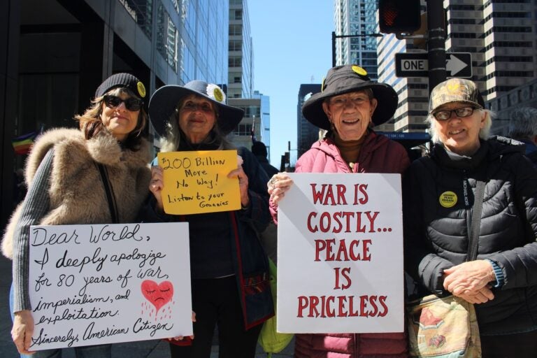 Iran protesters hold up signs in Philadelphia