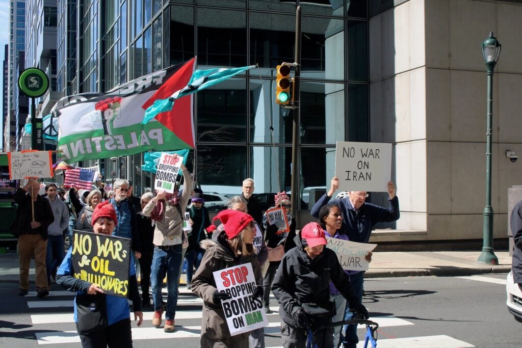 Iran protesters hold up signs in Philadelphia