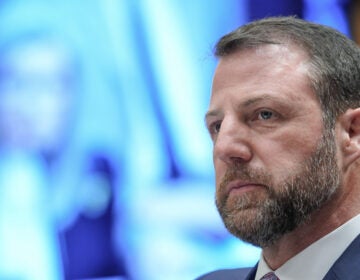 Sen. Markwayne Mullin stares to the left