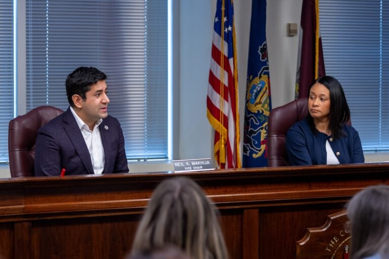 Montgomery County Commissioners Neil Makhija, left, and Jamila Winder, right
