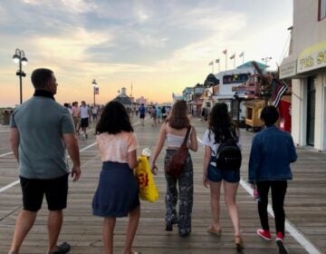 People walking on the Ocean City boardwalk