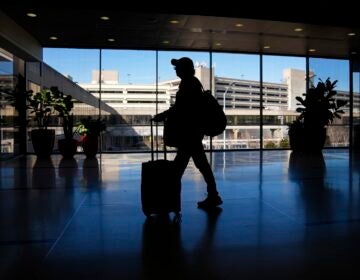 Philadelphia International Airport A traveler moves through Philadelphia International Airport in Philadelphia on Feb. 16, 2024.