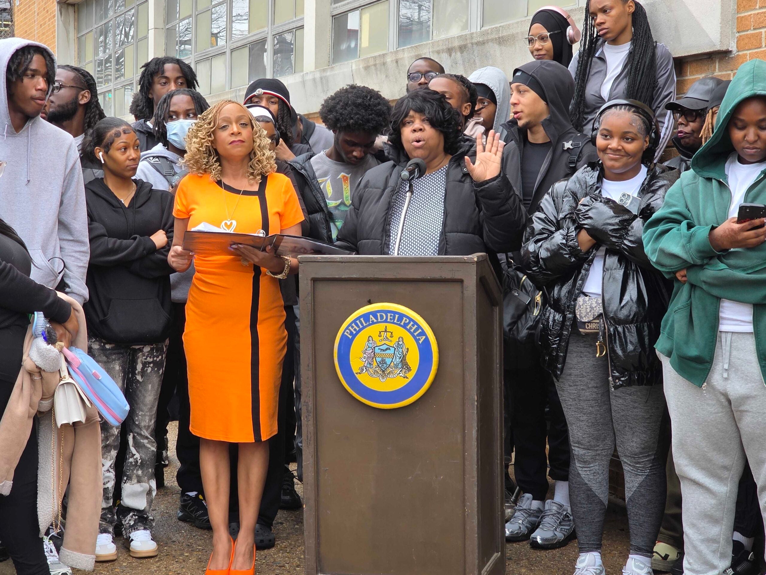 Cecelia Thompson speaks alongside students