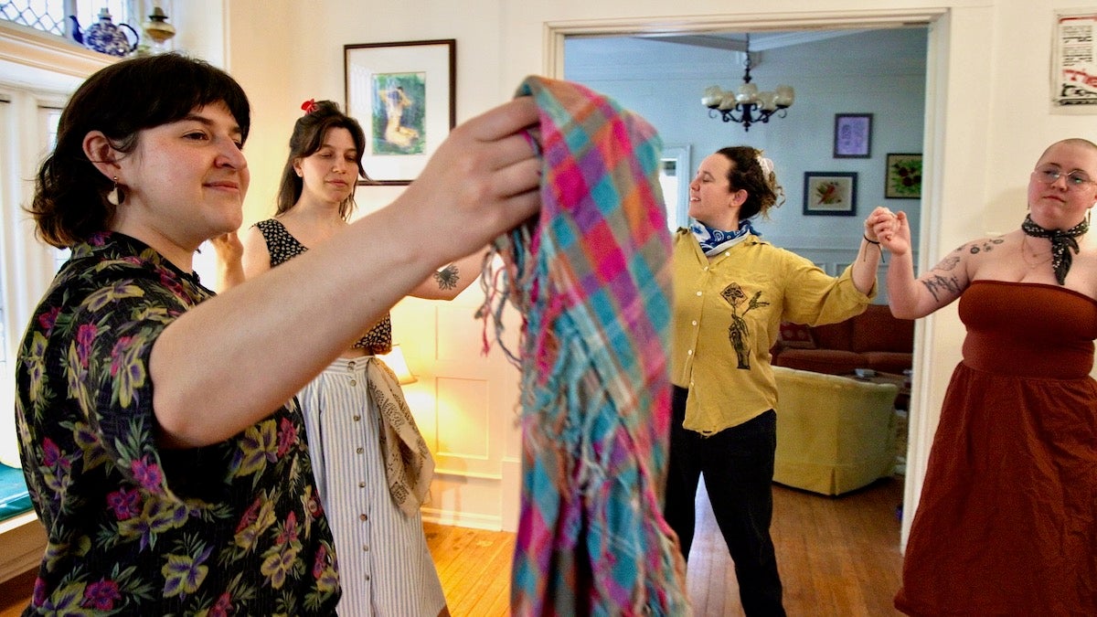 Miryam Coppersmith holding a tikhele