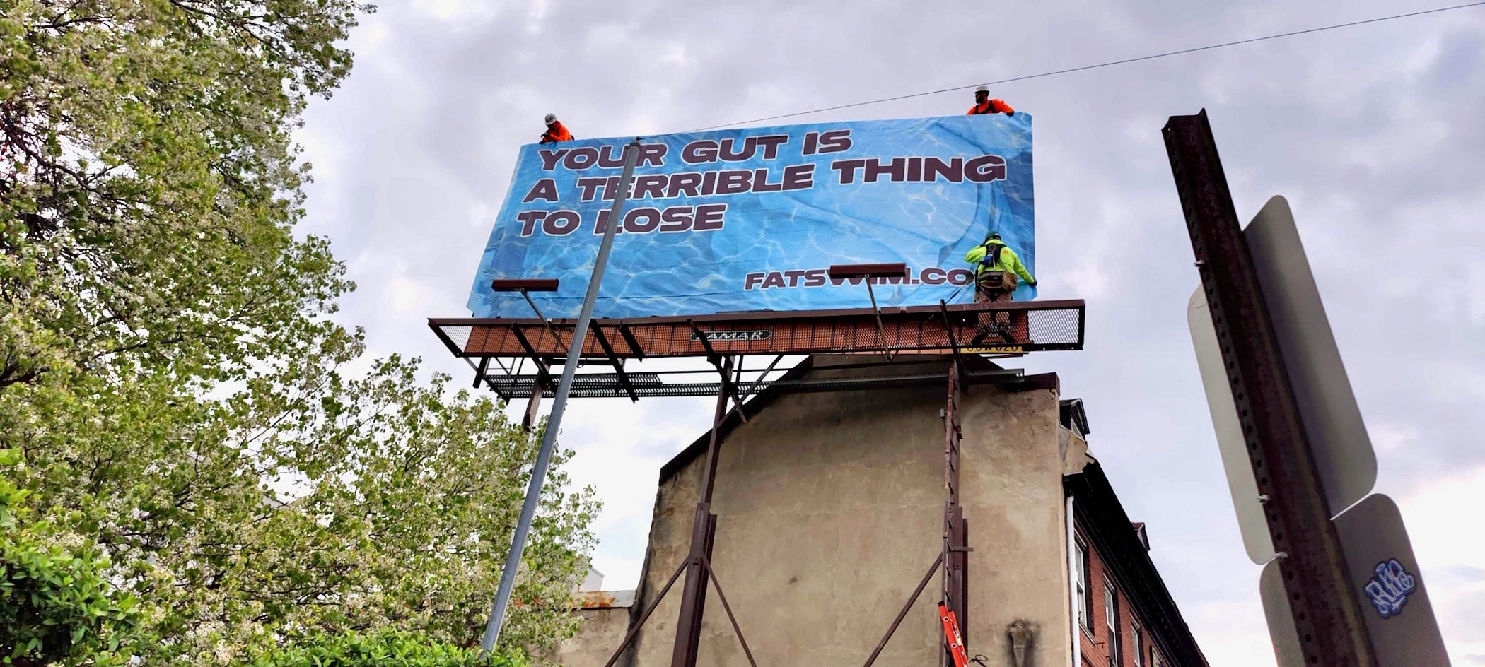 A new billboard on Philadelphia’s I-95 corridor says it’s OK to be fat. It was paid for by an anti-AI lawsuit