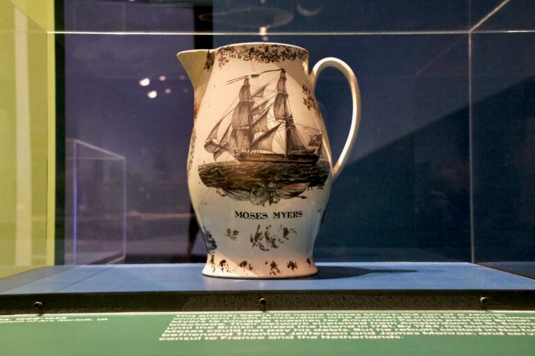 a vase bearing a ship and the name Moses Myers