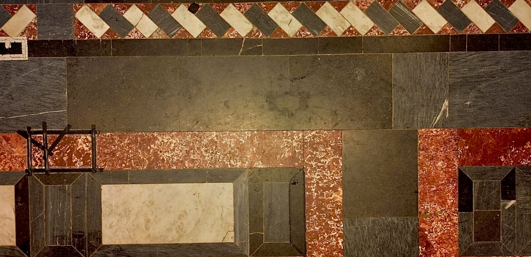black tape on the marble floor