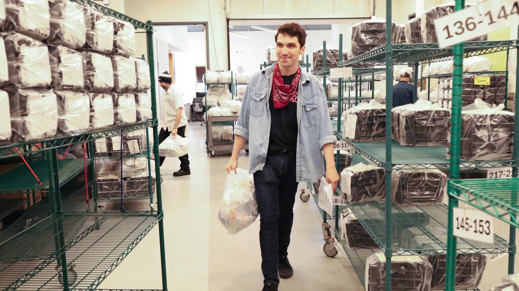 Jamie Pizziketti, volunteer logistics coordinator at MANNA, helps organize medically tailored meals