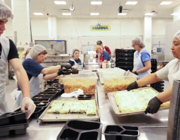Staff and volunteers at MANNA in Philadelphia put together medically tailored meals