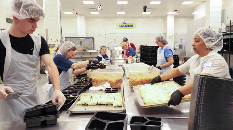 Staff and volunteers at MANNA in Philadelphia put together medically tailored meals