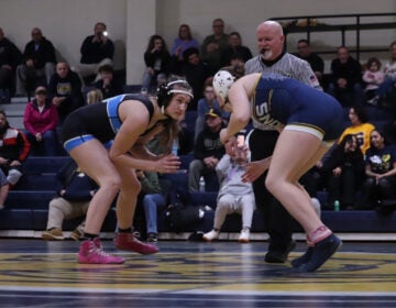 Addison Weismiller of St. Georges Tech faces off against an opponent