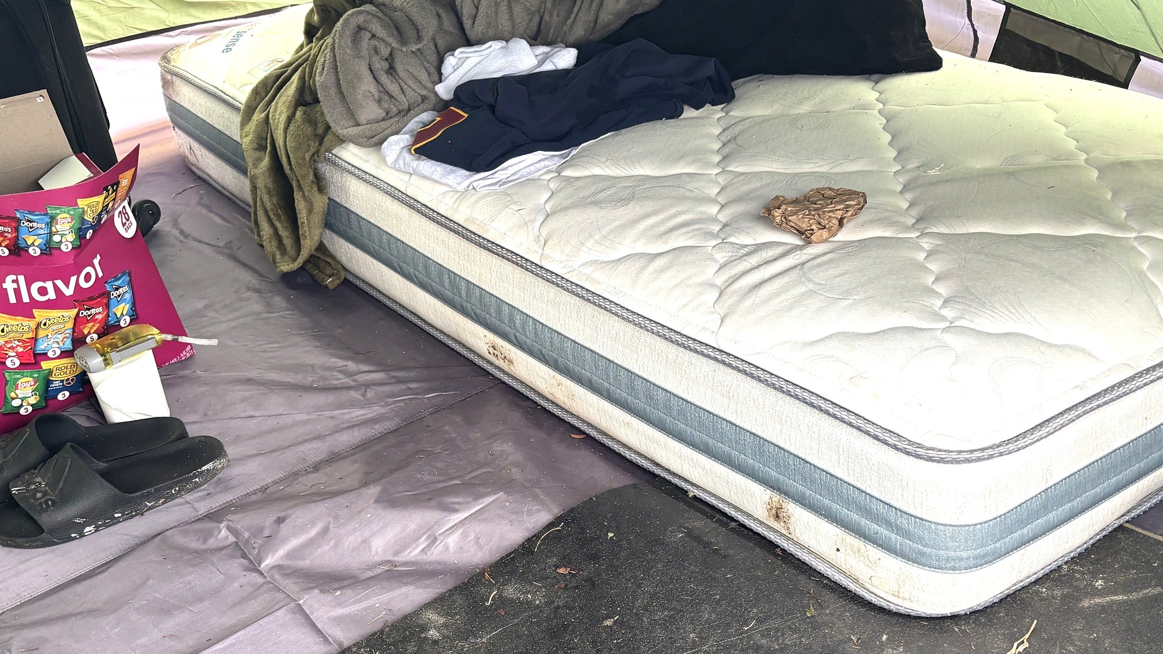 a mattress at a Wilmington homeless encampment