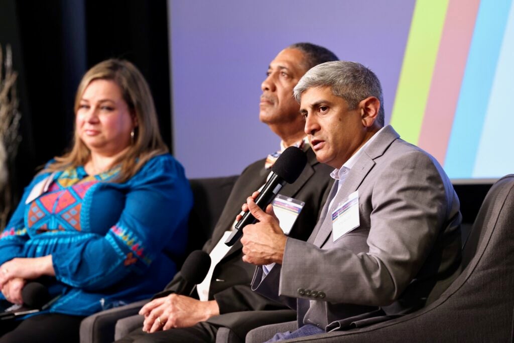 Anuj Gupta (right), president and CEO of The Welcoming Center