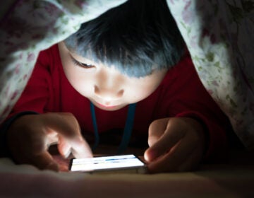 A child on a bed