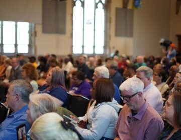 crozer-closure-town-hall-KC-04-041526 A crowd of people listen to a town hall about the future of Crozer-Chester Medical Center, at Widener University, on April 15, 2026