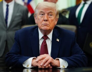donald-trump-2026-04-18-ap Donald Trump looks on