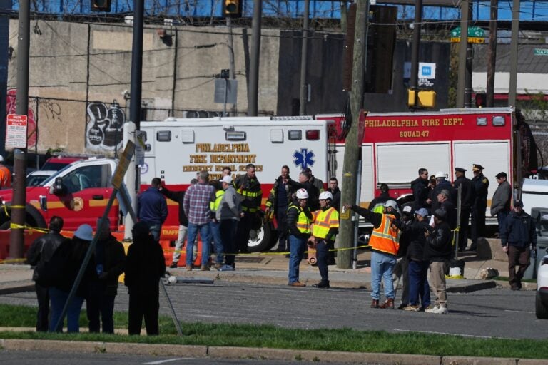 First responders gather near a partially collapsed CHOP parking garage in Grays Ferry, Philadelphia, Thursday, April 9, 2026.