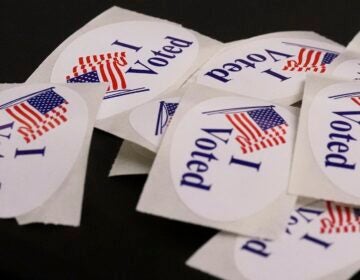 Election 2025 Boston Mayor ''I Voted'' stickers rest on a ballot box at a polling place.