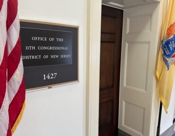 Election 2026 Decision Notes New Jersey A sign hanging on the wall for the 11th district office.