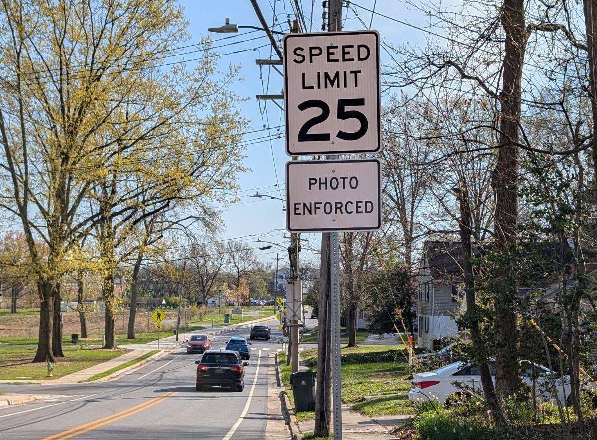a photo-enforced speed limit sign, 25 miles per hour