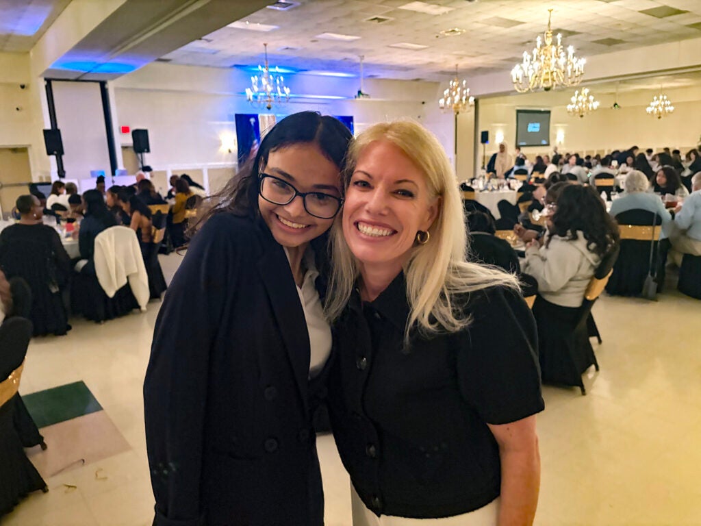 Elora Decker posing for a photo with Nicole Poore
