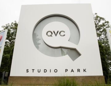 FILE - Corporate signage is shown outside a QVC facility in West Chester, Pa., Friday, July 7, 2017.   (AP Photo/Matt Rourke, File)