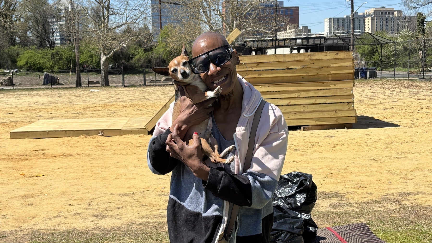 Schree Lewis said she loves her new Wilmington city-issued tent at Christina Park.