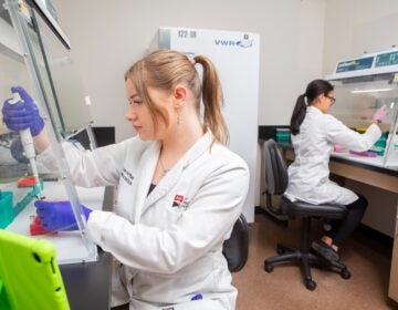 two scientists at the Pennsylvania Tick Research Lab