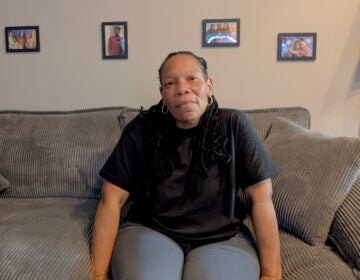 Dannielle Hadley, released from State Correctional Institution Muncy last year, sits in her West Philadelphia home in April 2026. | ASHLEE MOORE
