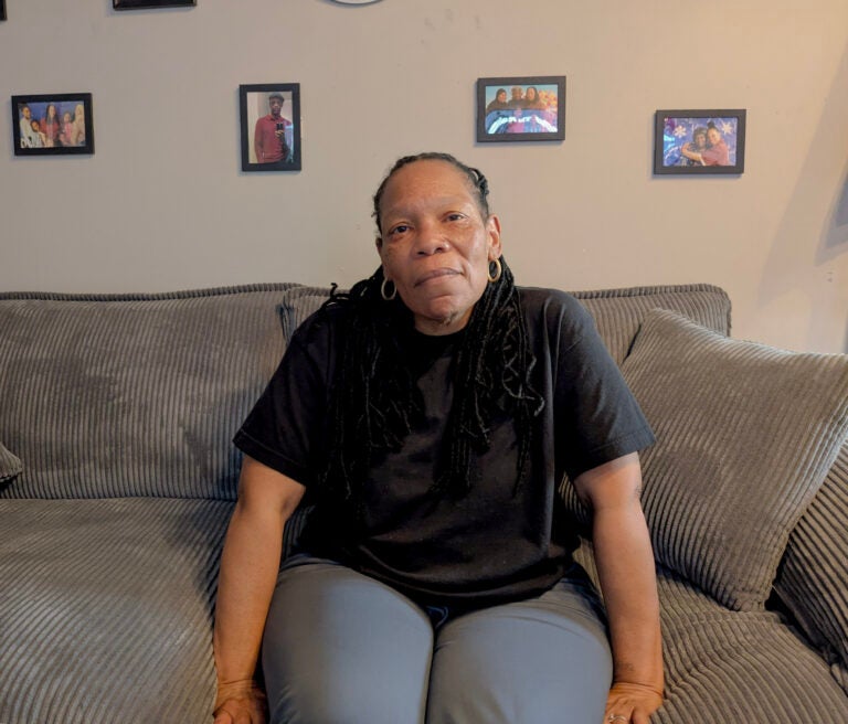 Dannielle Hadley, released from State Correctional Institution Muncy last year, sits in her West Philadelphia home in April 2026. | ASHLEE MOORE