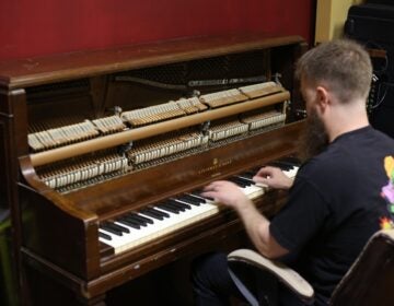 Corey Bernhard playing piano