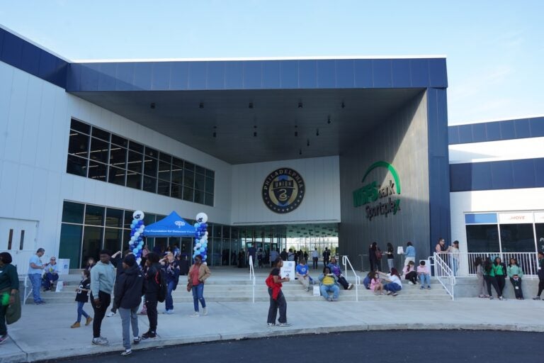 Delco Gives attendees eat outside of the WSFS Bank Sportsplex