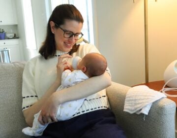 family-connects-postpartum-home-visits-new-jersey-4 Kara McPeak holds her nearly 4-week-old son