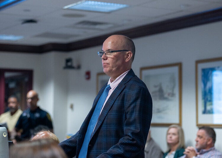 Scott France, executive director of the Montgomery County Planning Commission, stands in a suit