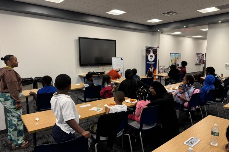 NAMI youth peer navigator Ashley Murray working with workshop attendees